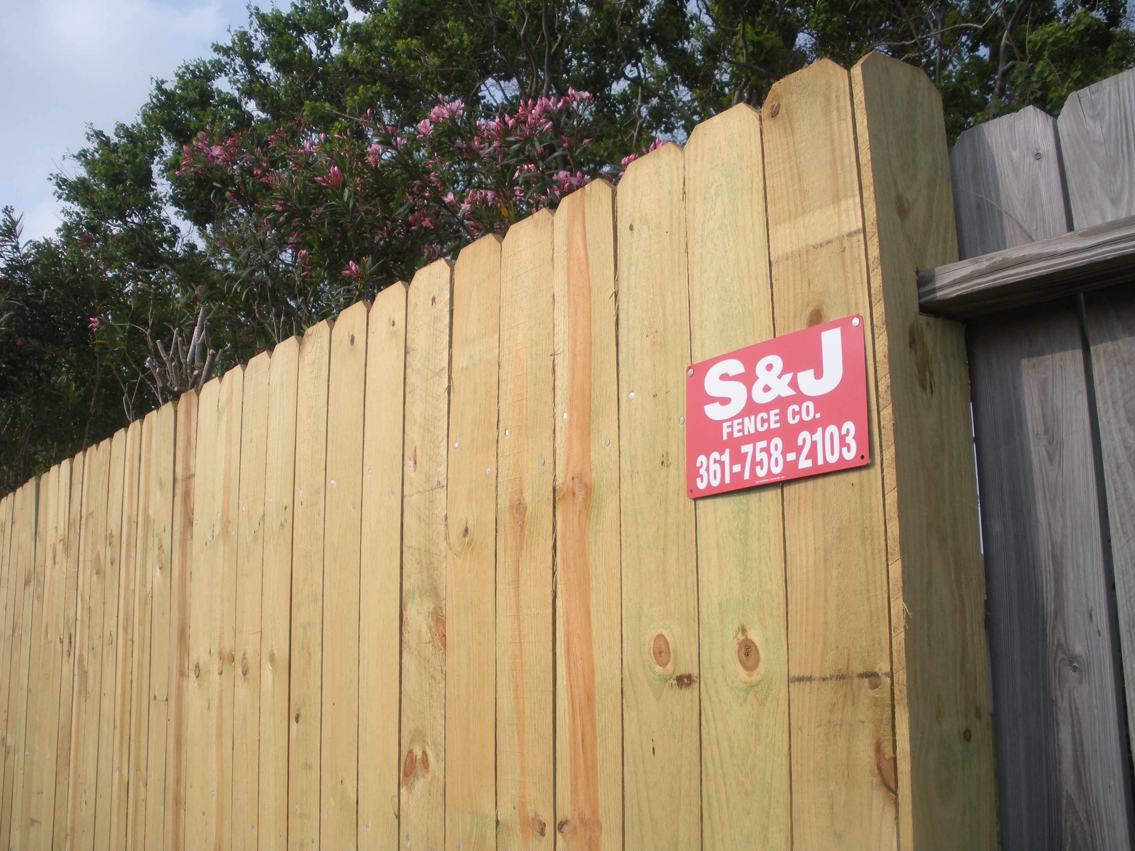 Residential fence completed by S & J Fence Co.